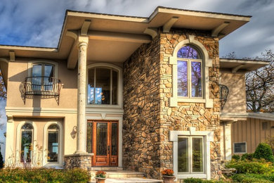 Example of a tuscan exterior home design in Detroit