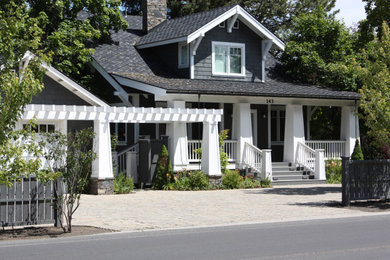 Inspiration for a coastal gray three-story wood exterior home remodel in Boise with a shingle roof
