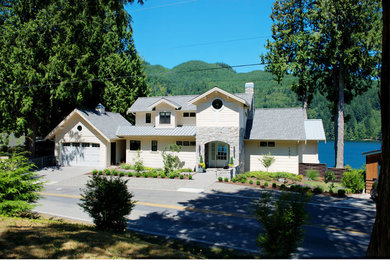 Example of a large arts and crafts exterior home design in Vancouver