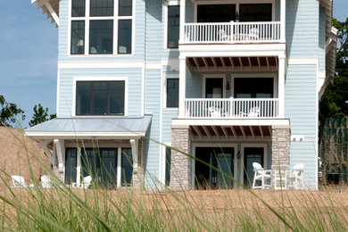 Coastal exterior home idea in Grand Rapids