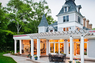 Traditional gray three-story wood exterior home idea in Minneapolis