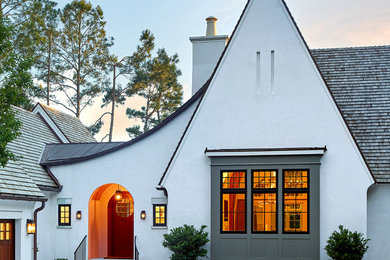 Transitional white one-story exterior home idea in Charleston with a shingle roof