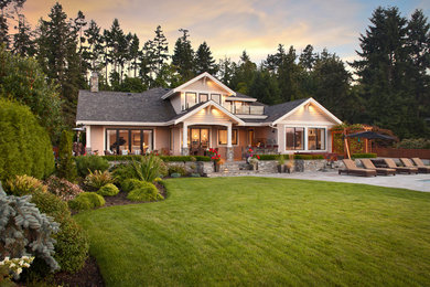 Inspiration for a mid-sized timeless two-story exterior home remodel in Vancouver