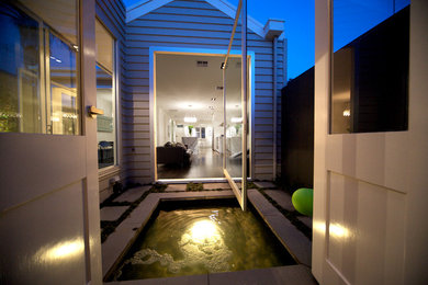 This is an example of a contemporary house exterior in Melbourne.