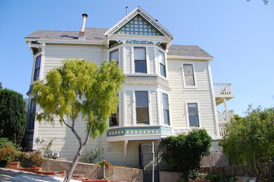 Inspiration for a victorian beige two-story exterior home remodel in San Francisco