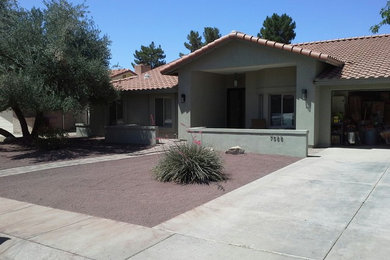 Example of a minimalist exterior home design in Phoenix