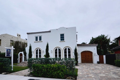 Example of a tuscan exterior home design in Miami