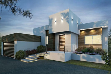 Medium sized and gey modern bungalow render house exterior in Los Angeles with a flat roof.