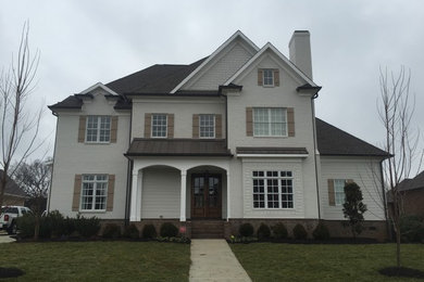 Example of a cottage exterior home design in Nashville