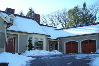 Mid-sized elegant gray two-story vinyl gable roof photo in Boston