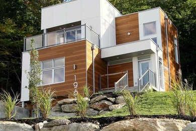 Example of a minimalist exterior home design in Montreal