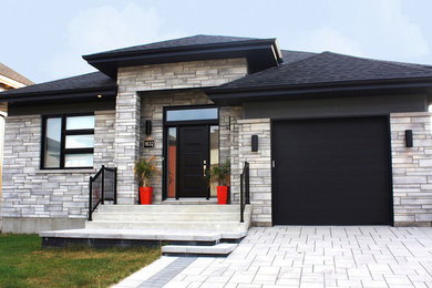 Example of an exterior home design in Montreal