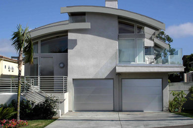 Inspiration for a contemporary two-story exterior home remodel in San Diego