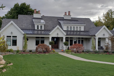 Example of a cottage exterior home design in Salt Lake City