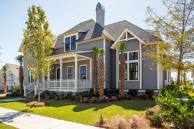 Example of a mid-sized beach style gray two-story mixed siding exterior home design in Charleston