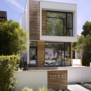 Inspiration for a modern wood exterior home remodel in Edmonton