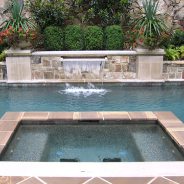 Limestone Water Feature with 'Spillway'; Limestone columns and Fieldstone beds