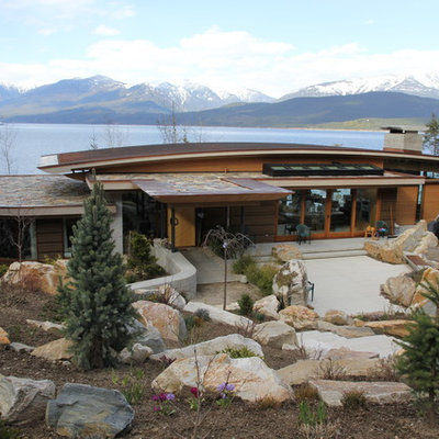 Example of a trendy wood exterior home design in Vancouver