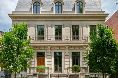 Inspiration for a huge timeless gray three-story stone exterior home remodel in Chicago with a shingle roof