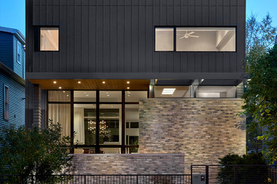 Diseño de fachada gris contemporánea de tamaño medio de dos plantas con revestimiento de aglomerado de cemento y tejado plano