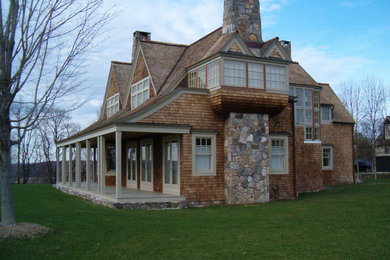 Example of a transitional exterior home design in Bridgeport