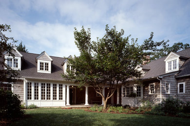 Example of a mid-sized classic two-story exterior home design in DC Metro