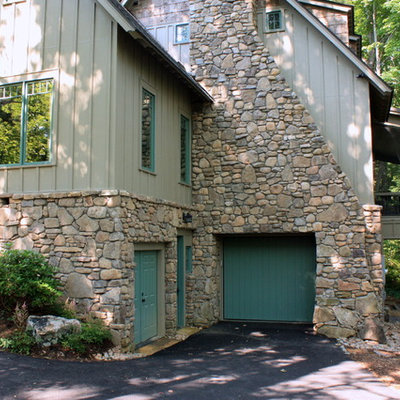 Elegant stone exterior home photo in Other
