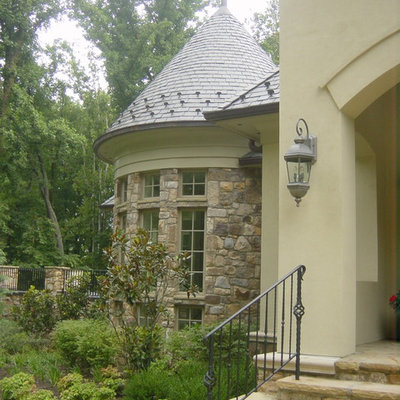 Elegant stone exterior home photo in DC Metro