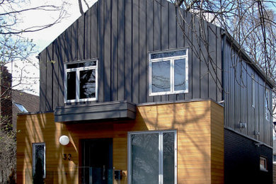 Inspiration for a modern gray two-story metal exterior home remodel in Toronto