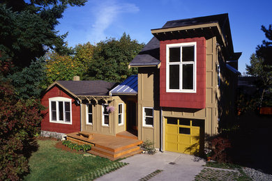 Design ideas for a medium sized and multi-coloured eclectic two floor detached house in Seattle with mixed cladding, a pitched roof and a shingle roof.