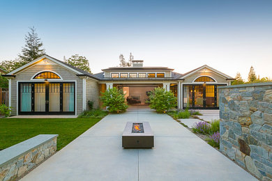 Inspiration for a transitional green one-story wood gable roof remodel in San Francisco