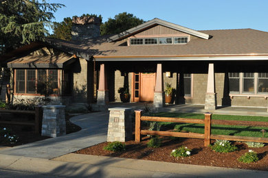 Example of an arts and crafts one-story wood exterior home design in San Francisco