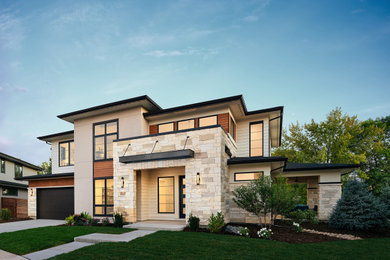 Example of a transitional exterior home design in Denver