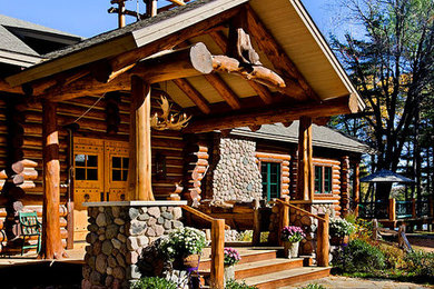 Rustic exterior home idea in Other