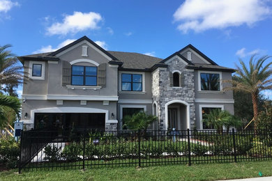 Example of a transitional exterior home design in Tampa