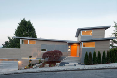 Three-story mixed siding exterior home idea in Seattle