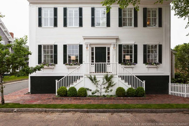 Traditional white two-story wood exterior home idea in Boston