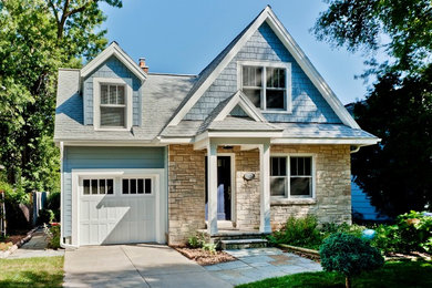 Inspiration for a small timeless blue two-story mixed siding exterior home remodel in Other with a shingle roof and a gray roof
