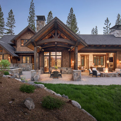 Inspiration for a large rustic brown two-story wood house exterior remodel in Sacramento