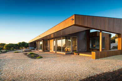 Contemporary house exterior in Adelaide with wood cladding.