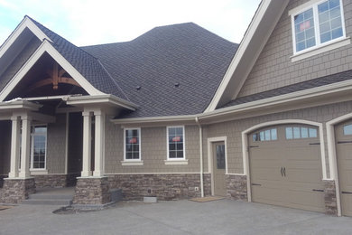 Example of an arts and crafts exterior home design in Boise