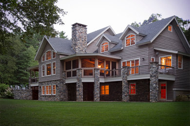 Inspiration for a large timeless gray three-story wood gable roof remodel in Boston