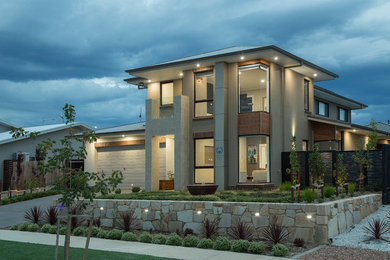 Photo of a contemporary house exterior in Canberra - Queanbeyan.