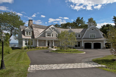 Large transitional gray three-story wood exterior home photo in Boston with a gambrel roof