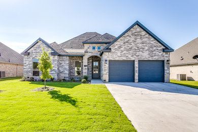 Elegant brick house exterior photo in Dallas