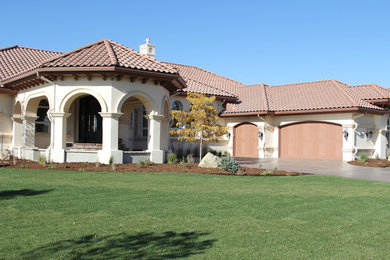 Example of a tuscan exterior home design in Denver