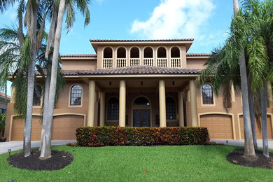 Inspiration for a huge mediterranean beige three-story stucco exterior home remodel in Tampa