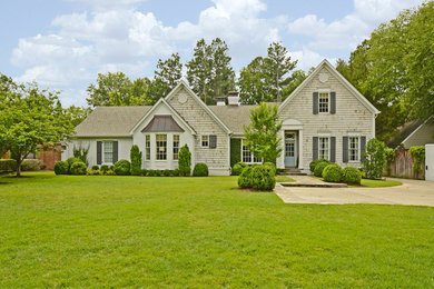 Mid-sized elegant beige one-story mixed siding exterior home photo in Atlanta