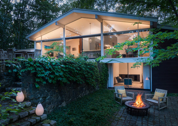 Midcentury Exterior by Flavin Architects