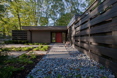 Inspiration for a mid-sized mid-century modern brown one-story wood exterior home remodel in Indianapolis